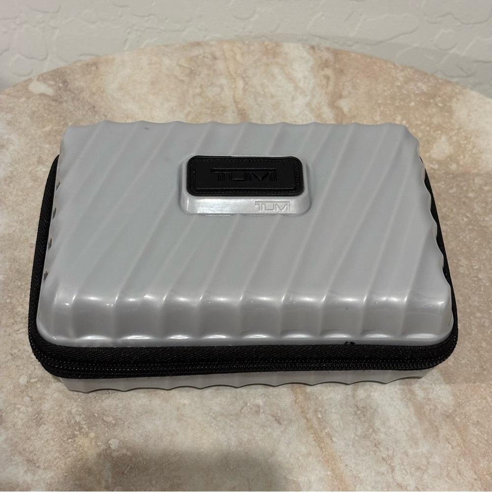 Tumi hard suitcase style cosmetic case